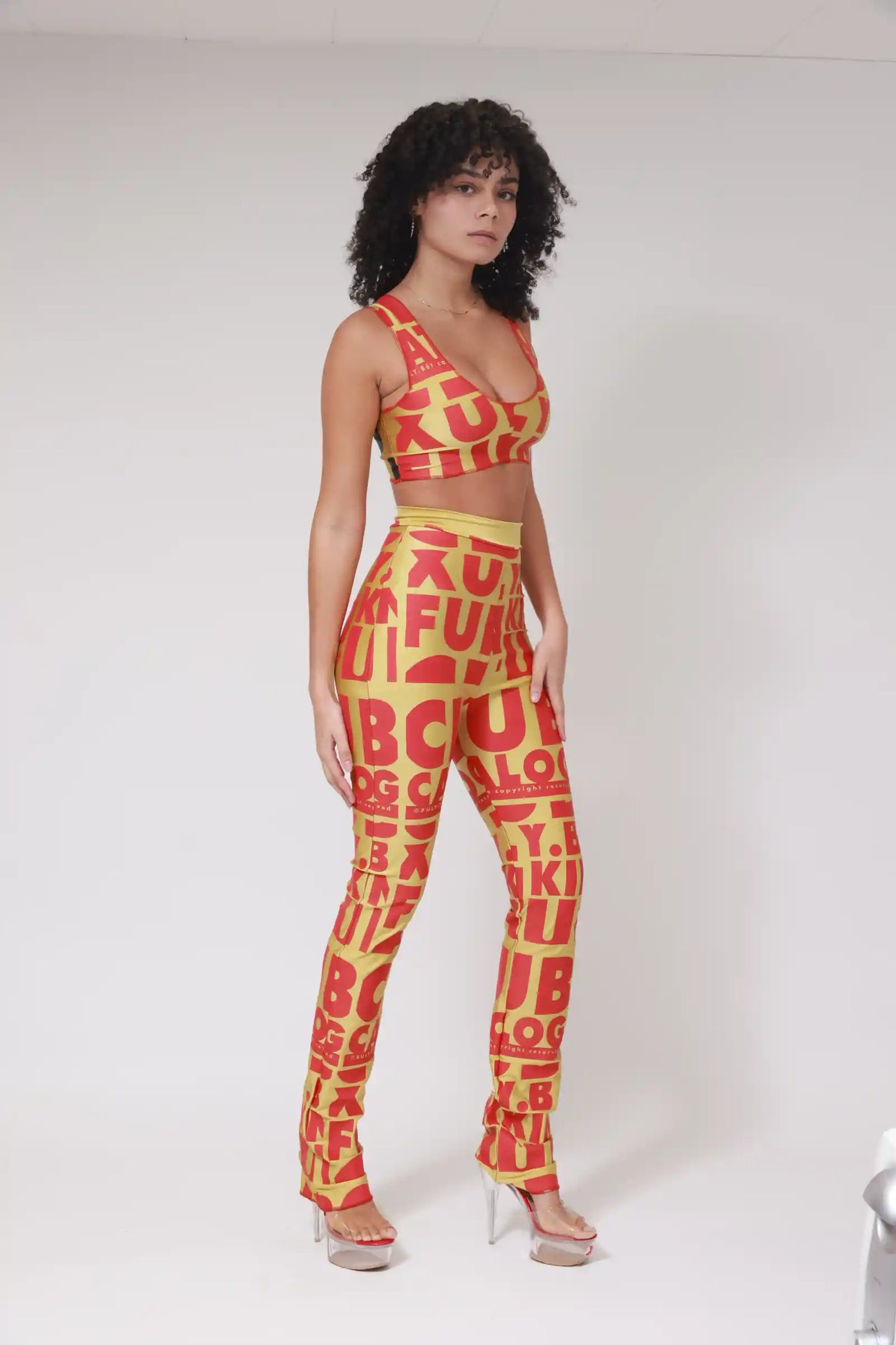 XB FLAGPRINT LONG LEGGINGS / RED ON GOLD / RED STITCHING